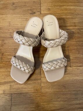 Never worn woman’s heeled sandals